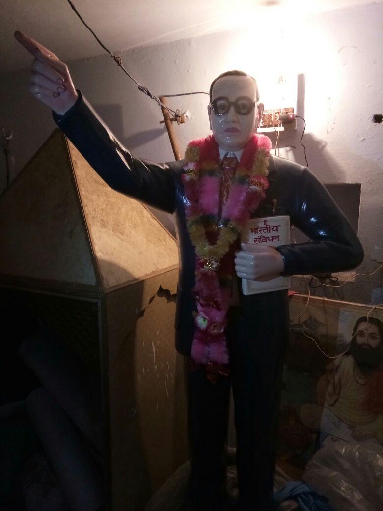 Babasaheb's statue which has now been kept in the corner of a store room.jpg
